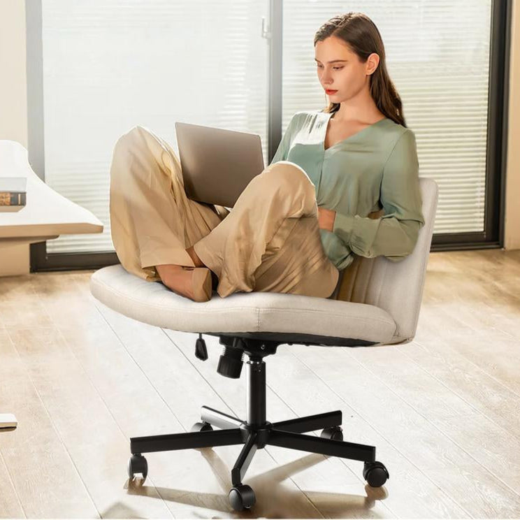 PUKAMI Criss Cross Office Chair: This stylish and ergonomic chair with wheels lets you sit comfortably cross-legged while you work. Perfect for home offices.